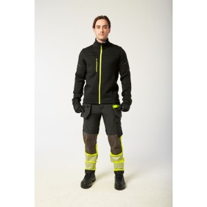 A black softshell jacket designed for use on construction sites and in industrial work environments.,
