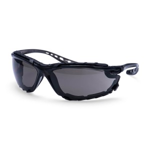 A pair of safety spectacles with clear impact-resistant lenses and adjustable side arms, for eye protection during site work.