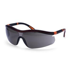 A pair of safety spectacles with clear impact-resistant lenses and adjustable side arms, for eye protection during site work.
