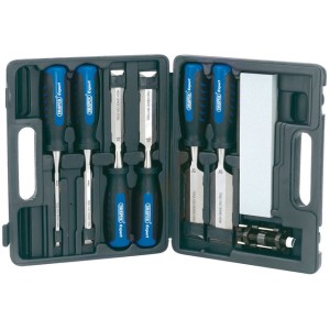 A black plastic case open to reveal a set of five wood chisels with blue and black handles, a sharpening stone, a honing guide, and additional accessories neatly organized in compartments.
