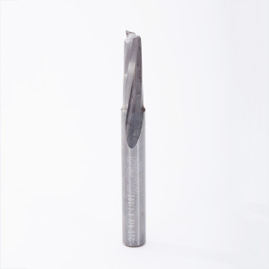 A close-up of a single metal drill bit or cutting tool standing upright on a plain white background. The tool has engraved markings along the shaft.,