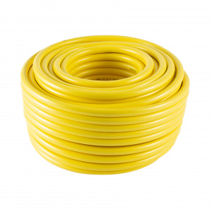 A coiled yellow garden hose is neatly arranged in a circular shape on a white background.,