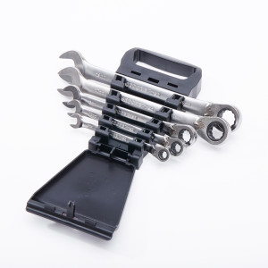 A set of six metal combination wrenches in various sizes, neatly arranged in a black plastic holder with an open lid, displayed on a white background.