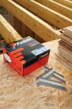 A steel ring-shank nail with annular rings along the shaft for enhanced withdrawal resistance in timber framing.,