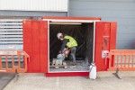 A steel Armorgard heavy-duty site storage unit with a steel construction, secure locking, and a load-rated base.