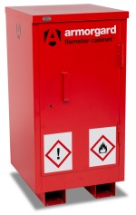 A red metal flammable storage cabinet labeled Armorgard flamstor cabinet with warning symbols for hazardous material and flammable contents on the front door.,