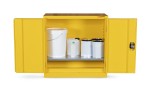A steel Armorgard lockable flammable-liquids storage cabinet with double doors and sump containment, for safely storing hazardous substances on site.