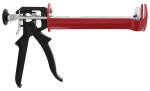 An orange and black Spit cordless power tool, with an ergonomic grip, designed for use on construction and maintenance tasks.