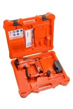 A Paslode cordless stapler with a magazine feed and safety tip, for fastening materials using heavy-duty staples.
