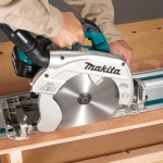 A teal and black Makita cordless circular saw with a 18V motor, an adjustable bevel plate, and a blade guard, for ripping and cross-cutting timber.