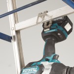 A teal and black Makita cordless impact driver with a 18V motor, a hex-chuck, and variable speed, for high-torque screw driving and fastening.