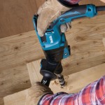 A teal and black Makita cordless SDS-Plus rotary hammer drill with 110V hammer, rotation, and chisel modes, for drilling and chiselling into concrete and masonry.