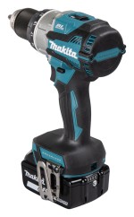 A teal and black Makita cordless combi drill with an 18V motor, a 13mm keyless chuck, and hammer, drill, and screwdriver modes.