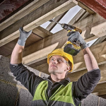 A yellow and black DEWALT cordless combi drill with an 18V motor, a 13mm keyless chuck, and hammer, drill, and screwdriver modes.