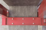 A metal through bolt anchor with a hex nut and washer, featuring a threaded shaft and expansion sleeve, designed for securing heavy loads to concrete or masonry surfaces.