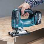 A teal and black Makita cordless jigsaw with 18V orbital action and a variable-speed trigger, for cutting curves and internal shapes.