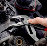 A pair of pliers with hardened steel jaws and insulated handles, for gripping and bending work.