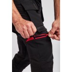 A pair of black work trousers designed for use on construction sites and in industrial work environments.,