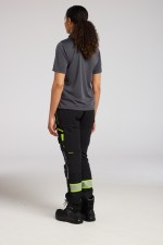 A women's grey polo shirt designed for use on construction sites and in industrial work environments.,
