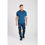 A blue polo shirt designed for use on construction sites and in industrial work environments.,