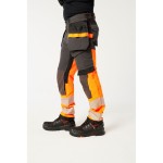 A pair of high-visibility orange trousers featuring retroreflective tape panels, stretch panels for ease of movement, suitable for a wide range of outdoor and site work applications.