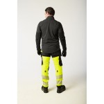 A pair of high-visibility yellow trousers featuring retroreflective tape panels, stretch panels for ease of movement, suitable for a wide range of outdoor and site work applications.