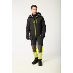 A black jacket designed for use on construction sites and in industrial work environments.,