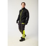 A black softshell jacket designed for use on construction sites and in industrial work environments.,