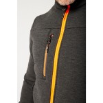 A grey workwear garment designed for use on construction sites and in industrial work environments.,