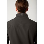 A black jacket featuring stretch panels for ease of movement, suitable for a wide range of outdoor and site work applications.
