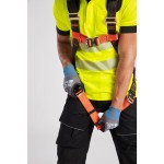 A black workwear garment designed for use on construction sites and in industrial work environments.,