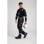 A black workwear garment featuring flame-resistant fabric, suitable for a wide range of outdoor and site work applications.