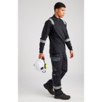 A black polo shirt featuring flame-resistant fabric, suitable for a wide range of outdoor and site work applications.