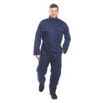A navy blue coverall featuring flame-resistant fabric, suitable for a wide range of outdoor and site work applications.