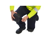 A pair of foam-padded knee pads with adjustable straps, designed to protect the knees during kneeling work.