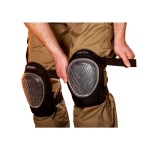 A pair of foam-padded knee pads with adjustable straps, designed to protect the knees during kneeling work.