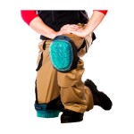 A pair of foam-padded knee pads with adjustable straps, designed to protect the knees during kneeling work.