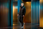 A black workwear garment featuring a warm thermal lining, suitable for a wide range of outdoor and site work applications.