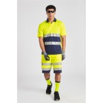 A high-visibility yellow workwear garment featuring retroreflective tape panels, suitable for a wide range of outdoor and site work applications.