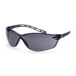 A pair of safety spectacles with clear impact-resistant lenses and adjustable side arms, for eye protection during site work.