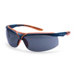 A pair of safety spectacles with clear impact-resistant lenses and adjustable side arms, for eye protection during site work.