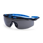 A pair of safety spectacles with clear impact-resistant lenses and adjustable side arms, for eye protection during site work.
