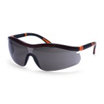 A pair of safety spectacles with clear impact-resistant lenses and adjustable side arms, for eye protection during site work.