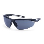 A pair of safety spectacles with clear impact-resistant lenses and adjustable side arms, for eye protection during site work.