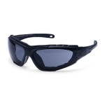 A pair of safety spectacles with clear impact-resistant lenses and adjustable side arms, for eye protection during site work.