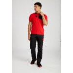 A red polo shirt designed for use on construction sites and in industrial work environments.,