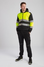 A high-visibility yellow sweatshirt featuring retroreflective tape panels, a full-length zip front, suitable for a wide range of outdoor and site work applications.