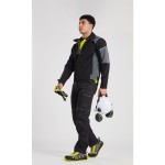 A black softshell jacket designed for use on construction sites and in industrial work environments.,