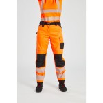 A pair of women's high-visibility orange trousers featuring retroreflective tape panels, stretch panels for ease of movement, suitable for a wide range of outdoor and site work applications.