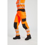 A pair of women's high-visibility orange trousers featuring retroreflective tape panels, stretch panels for ease of movement, suitable for a wide range of outdoor and site work applications.